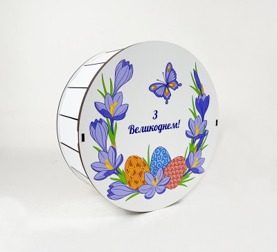 Коробка кругла "З Великоднем!"з квітами та писанками Коробка кругла "З Великоднем!"з квітами та писанками